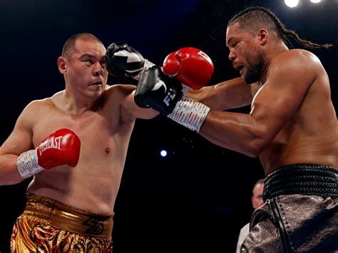 Zhang eyes heavyweight title fight after shock win over Joyce | Boxing News | Al Jazeera