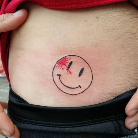 Watchmen Smiley Face Tattoo