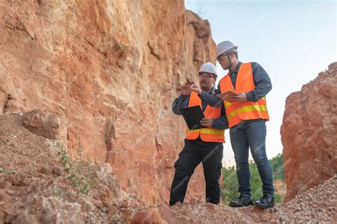 Premium Photo | Geologist surveying mineExplorers collect soil samples ...