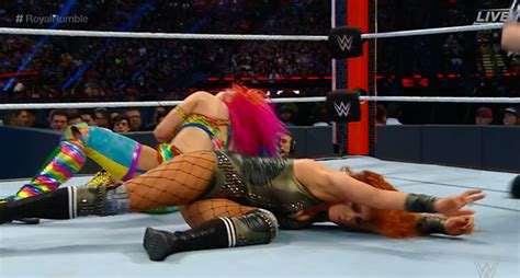 Becky Lynch wardrobe malfunction forces Royal Rumble winner to cover ...