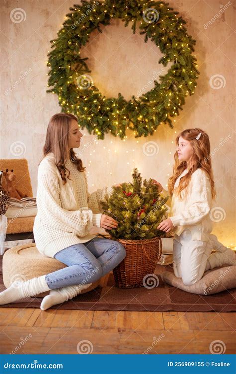 Lovely Girls with Blonde Curly Hair in a White Knitted Sweaters and ...