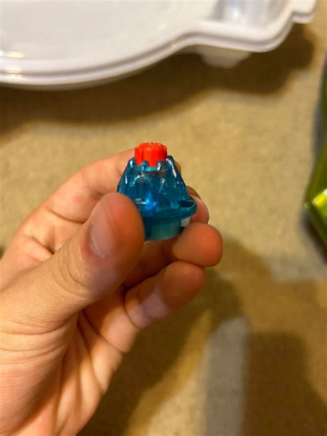 Why does my evolution driver look like the rubber is plastic. The driver is 100% Takara Tomy. It ...