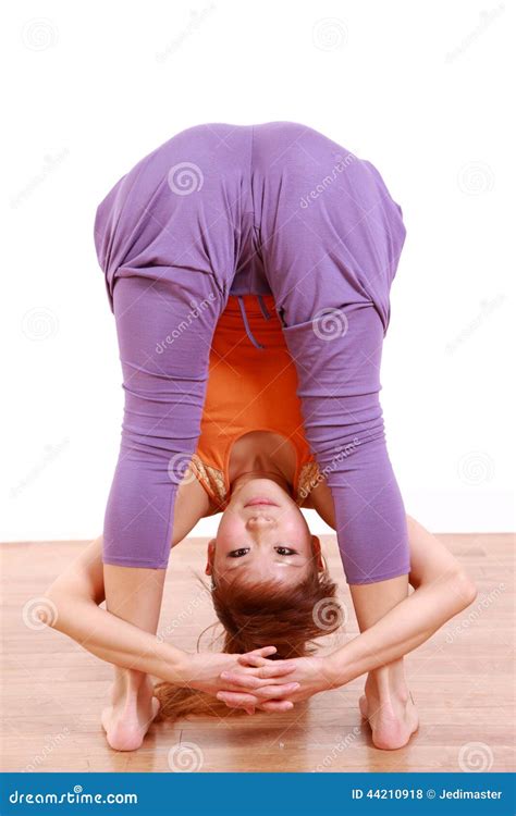 Young Japanese Woman Doing YOGA Standing Forward Bend Stock Photo ...