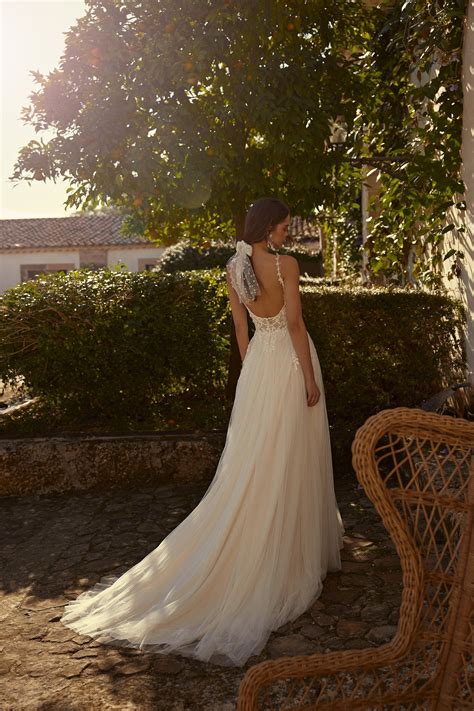 66301: A-Line Bridal Dress with Plunging Bikini Neckline and 3D Flowers | Lillian West