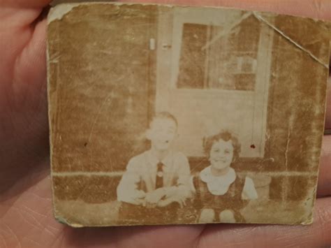 Can anyone fix this Pic of my mom and her brother. will tip! we tried ...