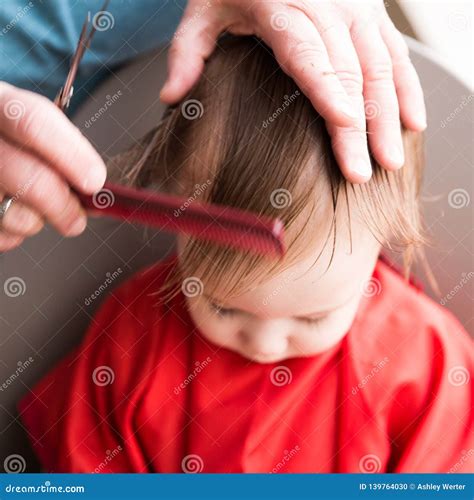 Baby boys first haircut stock photo. Image of cape, happy - 139764030