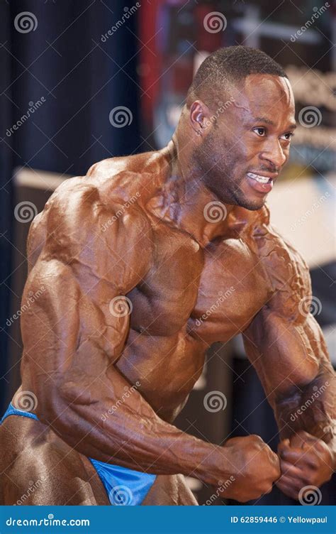 Male Bodybuilder Michael Muzo Shows His Most Muscular Pose Editorial ...