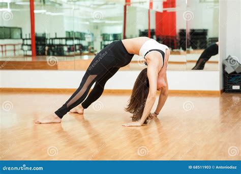 Flexible Young Woman Doing a Back Arch Stock Image - Image of people ...
