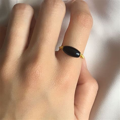 black and gold ring
