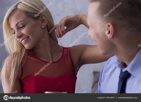 Sexy young woman seducing man — Stock Photo © photographee.eu #149314870