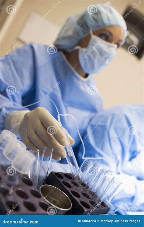 Nurse Assisting with Egg Retrieval Procedure Stock Photo - Image of male, medical: 5004224