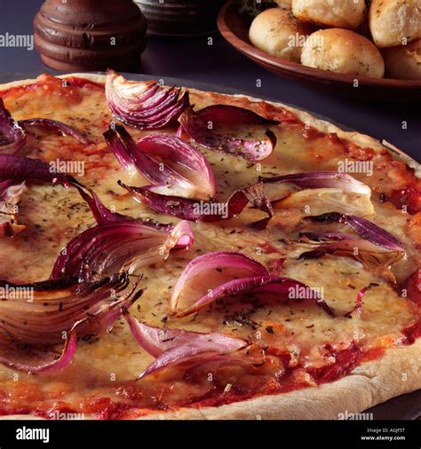 A red onion pizza Stock Photo - Alamy