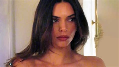 Kendall Jenner goes topless and shows off big pout in new video after ...