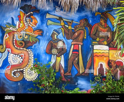 Colorful murals depicting Mayan culture on walls near Chichen Itza ...