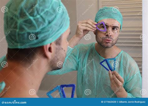 Plastic Surgery Patient Checking His Face Symmetry Stock Photo - Image ...
