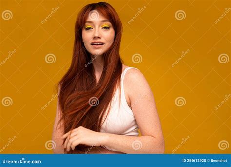 Positive Ginger Girl with Yellow Makeup, Natural Freckles, Long Hair ...