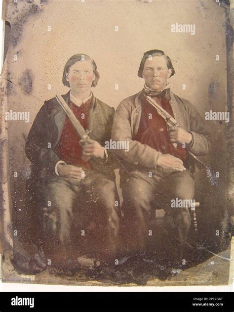 Two unidentified soldiers in non-regulation Confederate uniforms with ...