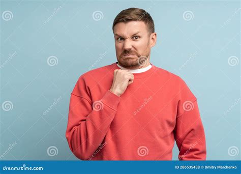 Emotion of Disgust on Face of Young Man. Guy Looks at Camera ...