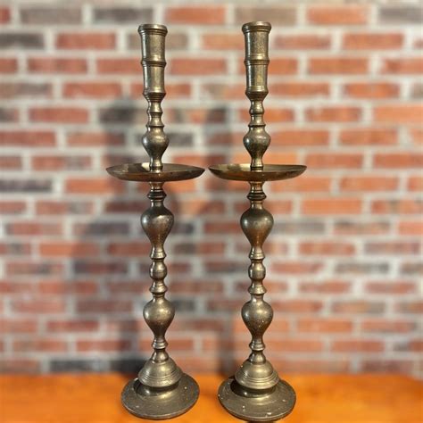 Pair of Etched Brass Floor Candle Holders | EstateSales.org