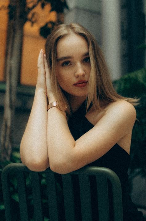 Woman in Black Dress Sitting on a Chair · Free Stock Photo