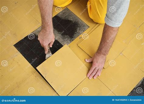 Removing Vinyl Floor Tiles: A Step-By-Step Guide - Flooring Designs