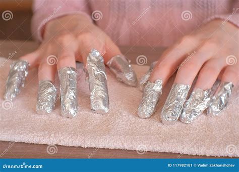 Removing Gel Polish from Nails. All Fingers with Foil on Both Hands ...
