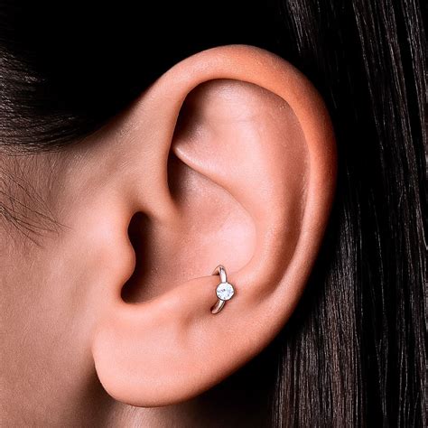 Anti-Tragus Piercing Guide: Pain, Healing, Jewelry & Aftercare ...