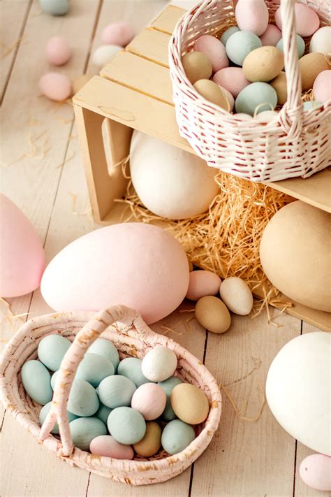 Download Easter Eggs In Baskets On A Wooden Table Wallpaper ...