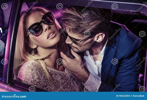 Nightlife - Handsome Man Seducing a Beautiful Lady Stock Photo - Image ...