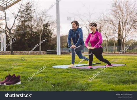 Mature Couple Exercising Park Stock Photo 2262760839 | Shutterstock