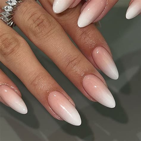 Admire 25 White Almond Nail Designs of 2024
