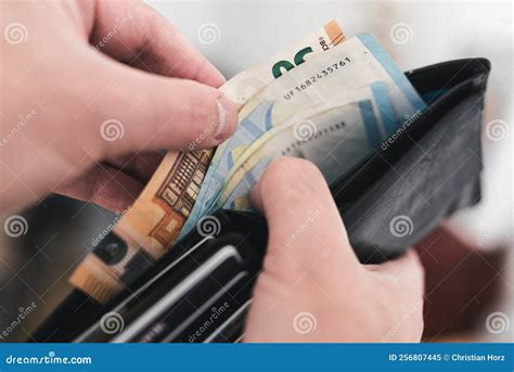 Close-up View of Hands Taking Money Out of a Wallet Stock Image - Image ...