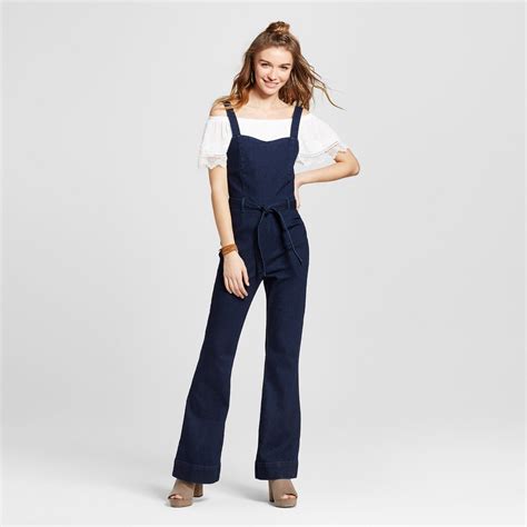 Make a mod statement in the Women's Tie Waist Denim Jumpsuit by ...