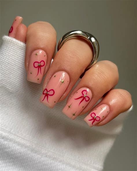 22 Adorable Bow Nail Ideas for a Dainty and Coquette Holiday Manicure