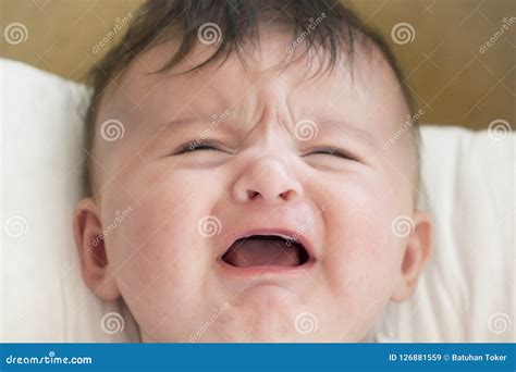 Baby is Crying. Baby Screaming because Her Stomach Hurts Stock Image ...
