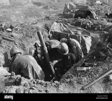 Marines fire an 81 mm mortar in the Battle of Obong-ni Ridge, August 17 ...