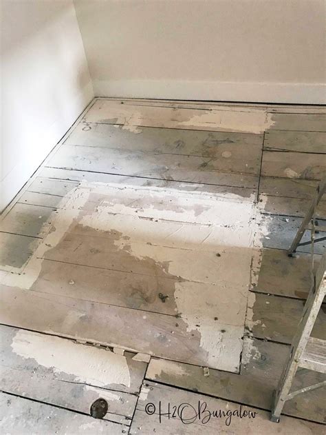 DIY tutorial on how to paint wood floors with detailed instructions to ...