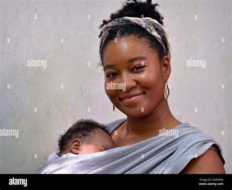 Black sling hi-res stock photography and images - Alamy
