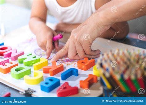 Asian Little Girl is Learning English Letters Stock Image - Image of ...