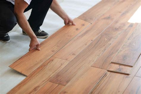 Laminate vs. Vinyl Flooring: Costs, Pros, Cons, & Differences (2025)