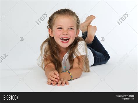 Little Girl Lying On Image & Photo (Free Trial) | Bigstock