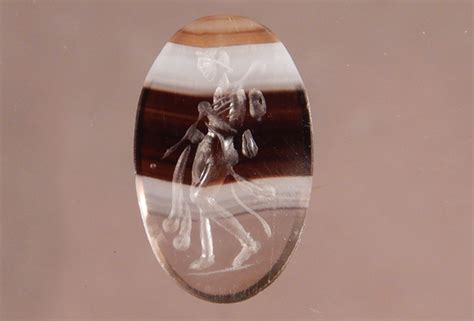 Precious Roman Gem Found in Lagoon Depicts Mystery Mythological Figure - Newsweek