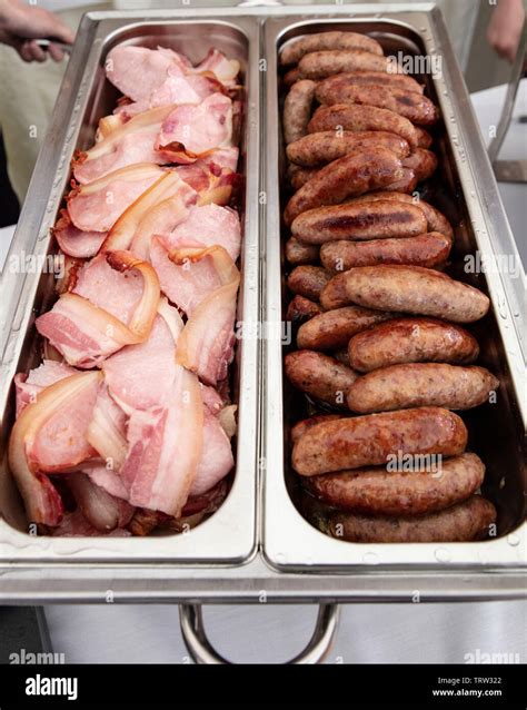 Bacon And Sausages Ready for Breakfast Serving at an Event Stock Photo ...