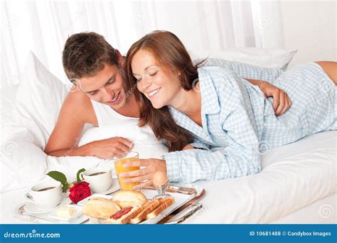 Happy Couple Having Breakfast in Bed Stock Photo - Image of smiling ...