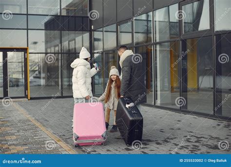 Mother, Father and Daughter with Luggage Going To Airport Terminal Stock Photo - Image of ...