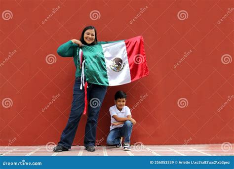 Latin Mexican Mom and Son Show the Flag of Mexico Very Proud of Their ...
