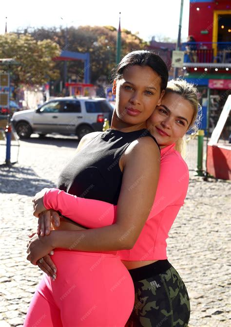 Two pretty sexy stylish cool generation z girls lgbtq lesbian couple ...