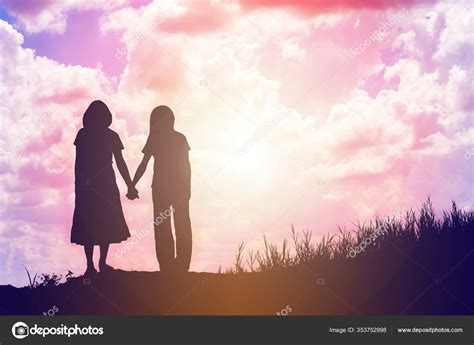 Two Girls Holding Hands Silhouette