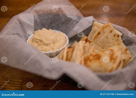 Hummus and pita bread stock photo. Image of chickpea - 271161750