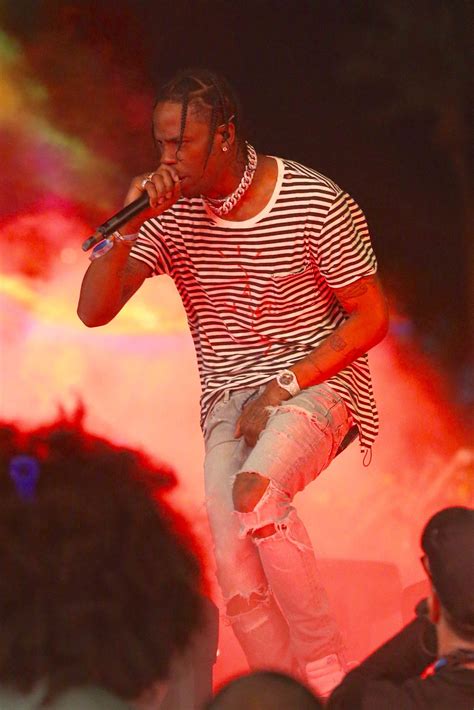 Travis Scott Stops Security From Booting Off Fan Who Rushed On Stage